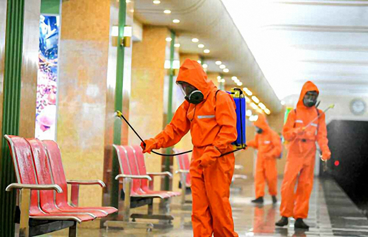 Health officials disinfect a subway station in Pyongyang in this photo from Rodong Sinmun on Aug. 1, 2020. (Rodong Sinmun-Yonhap)