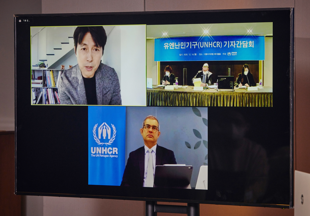 지난 해 12월 열린 유엔난민기구 연말 기자간담회에서 친선대사로 활동하는 배우 정우성 씨가 온라인 화상회의 플랫폼으로 발언하고 있다. [연합]