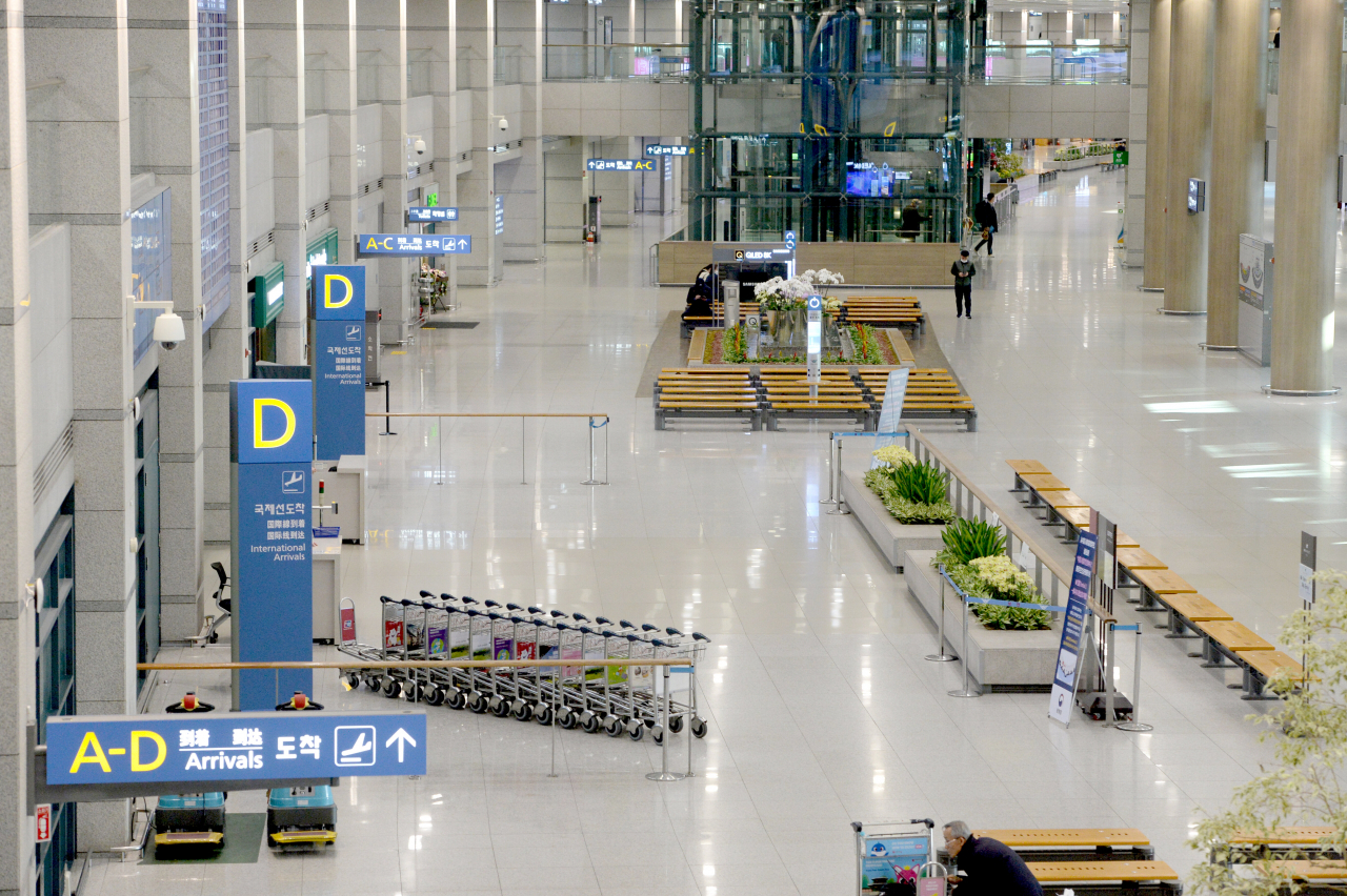 지난해 한산한 인천공항 입국장 [연합]