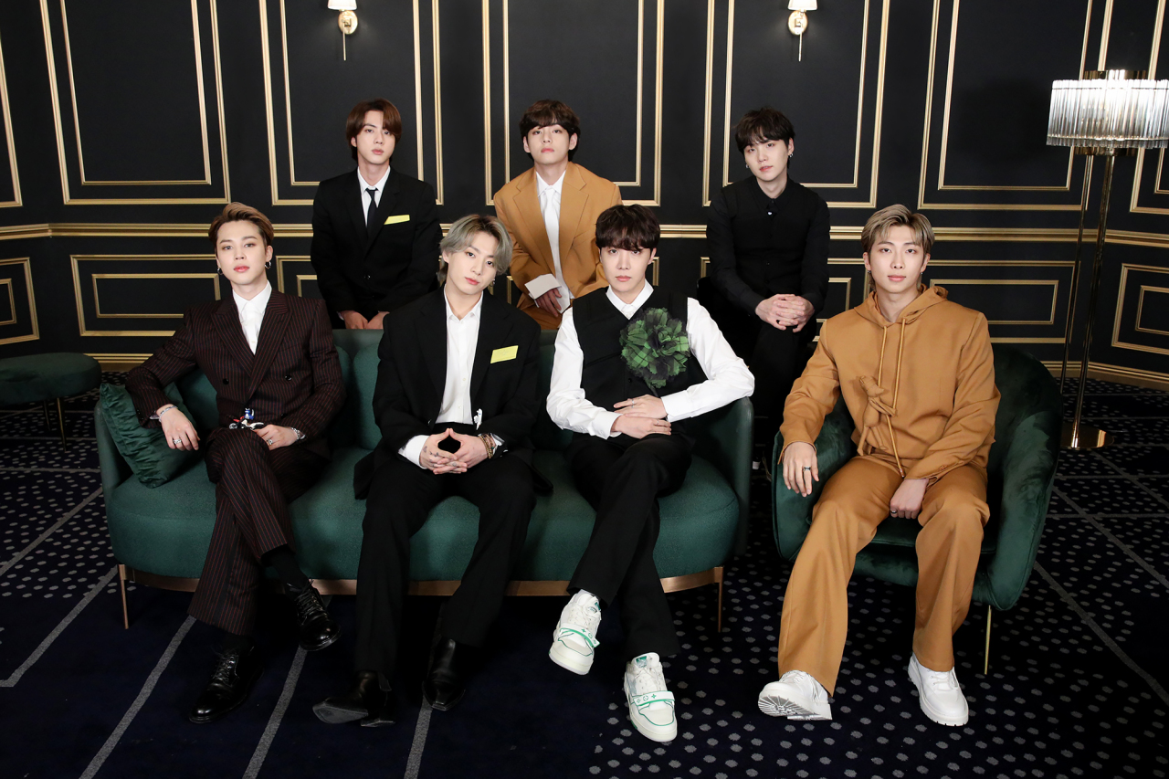 The members of BTS pose for a picture on the red carpet at the 63rd Grammy Awards in Los Angeles on Monday. (Big Hit Entertainment)