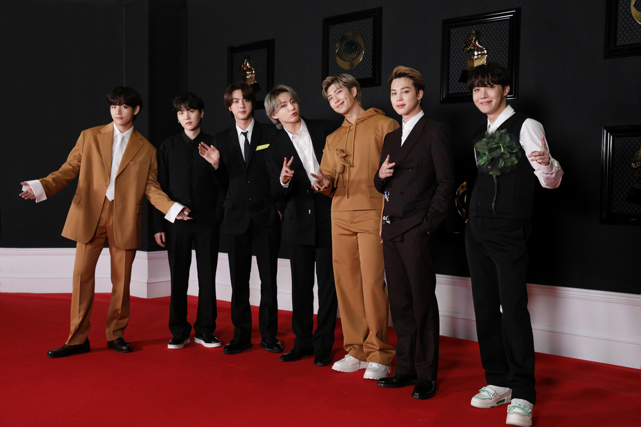 The members of BTS pose for a picture on the red carpet at the 63rd Grammy Awards in Los Angeles on Monday. (Big Hit Entertainment)