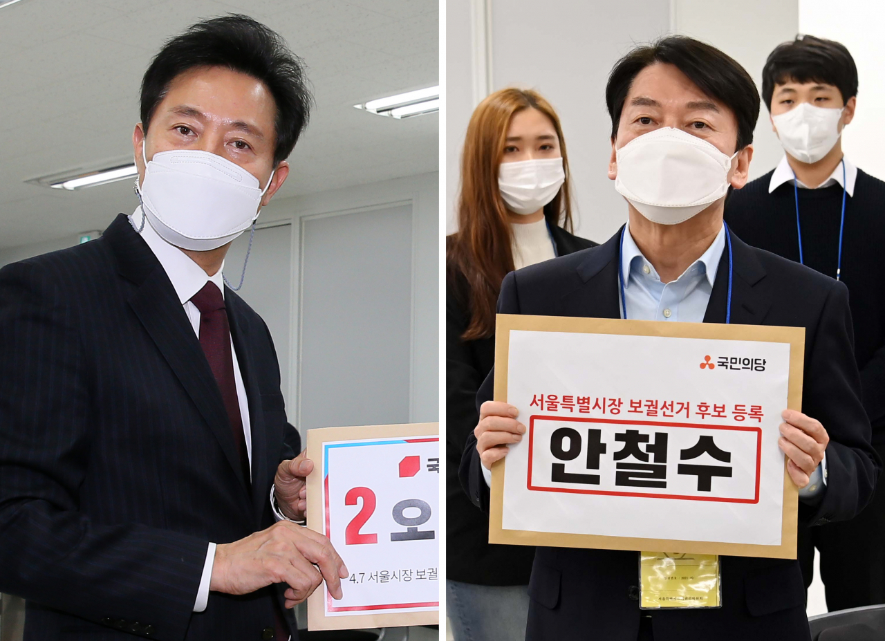 오세훈 국민의힘 서울시장 후보(왼쪽)와 안철수 국민의당 서울시장 후보가 19일 서울 종로구 서울시선거관리위원회에서 각각 후보자 등록을 하고 있다. [연합]