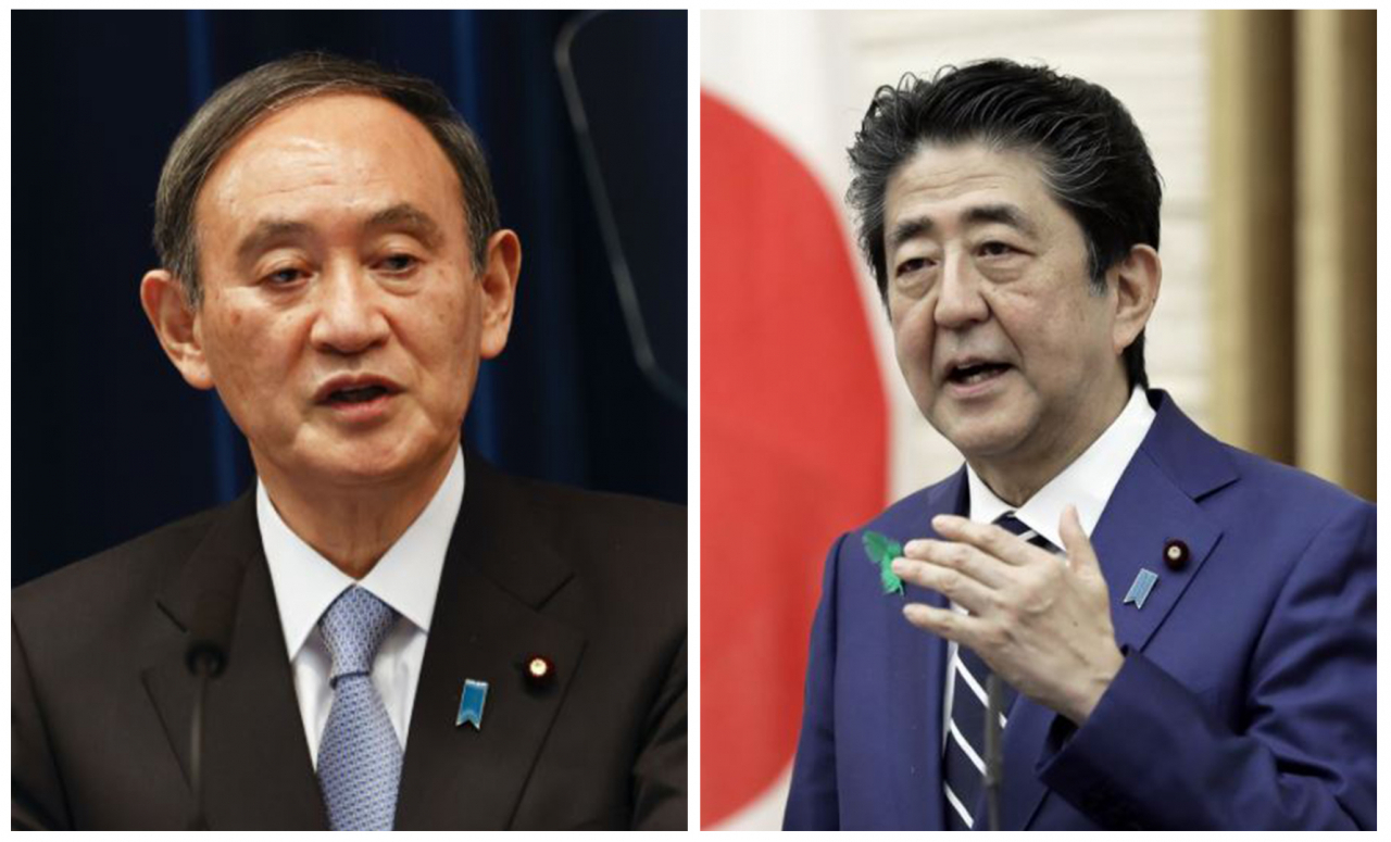 스가 요시히데(菅義偉·왼쪽) 일본 총리와 아베 신조(安倍晋三) 전 총리. [AP]