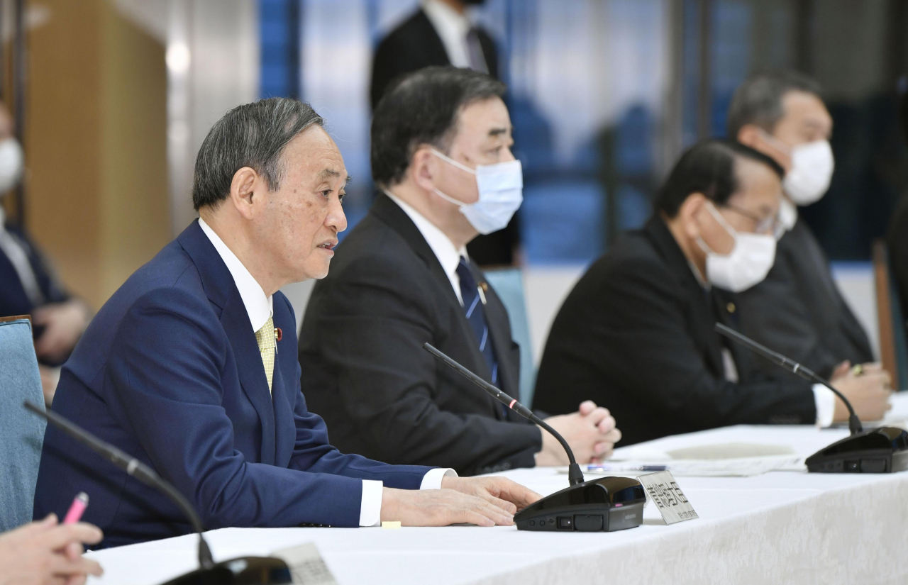스가 요시히데(菅義偉) 일본 총리가 13일 도쿄 소재 총리실에서 열린 각료회의에서 발언하고 있다. [연합]