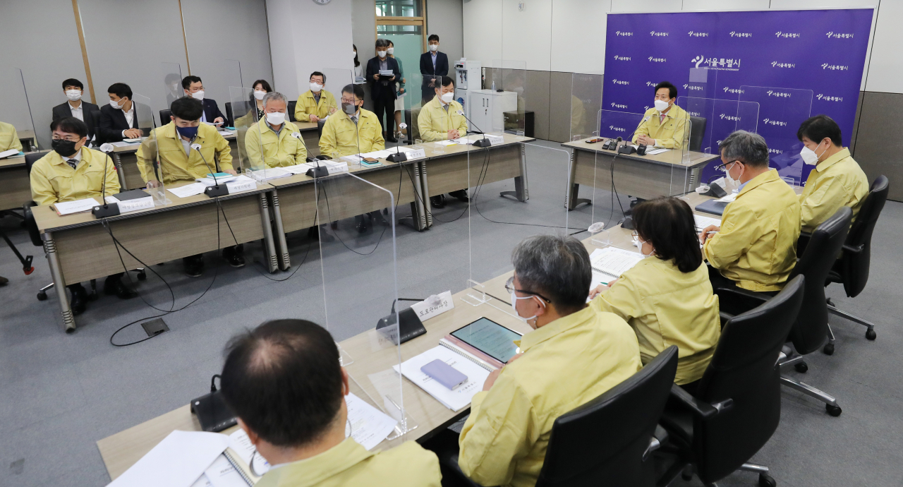 오세훈 서울시장이 28일 오전 서울 중구 서울시청에서 화상으로 열린 '제159차 서울시구청장협의회'에 참석, 인사말을 하고 있다. 연합뉴스