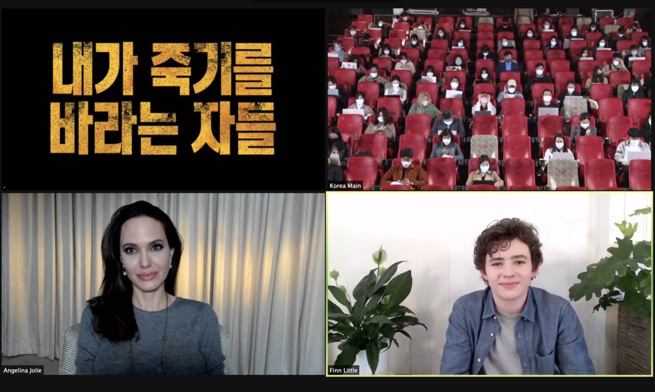 Angelina Jolie and Finn Little attend a video press conference held with local reports at CGV Yongsan in central Seoul on Tuesday. (Warner Bros.)