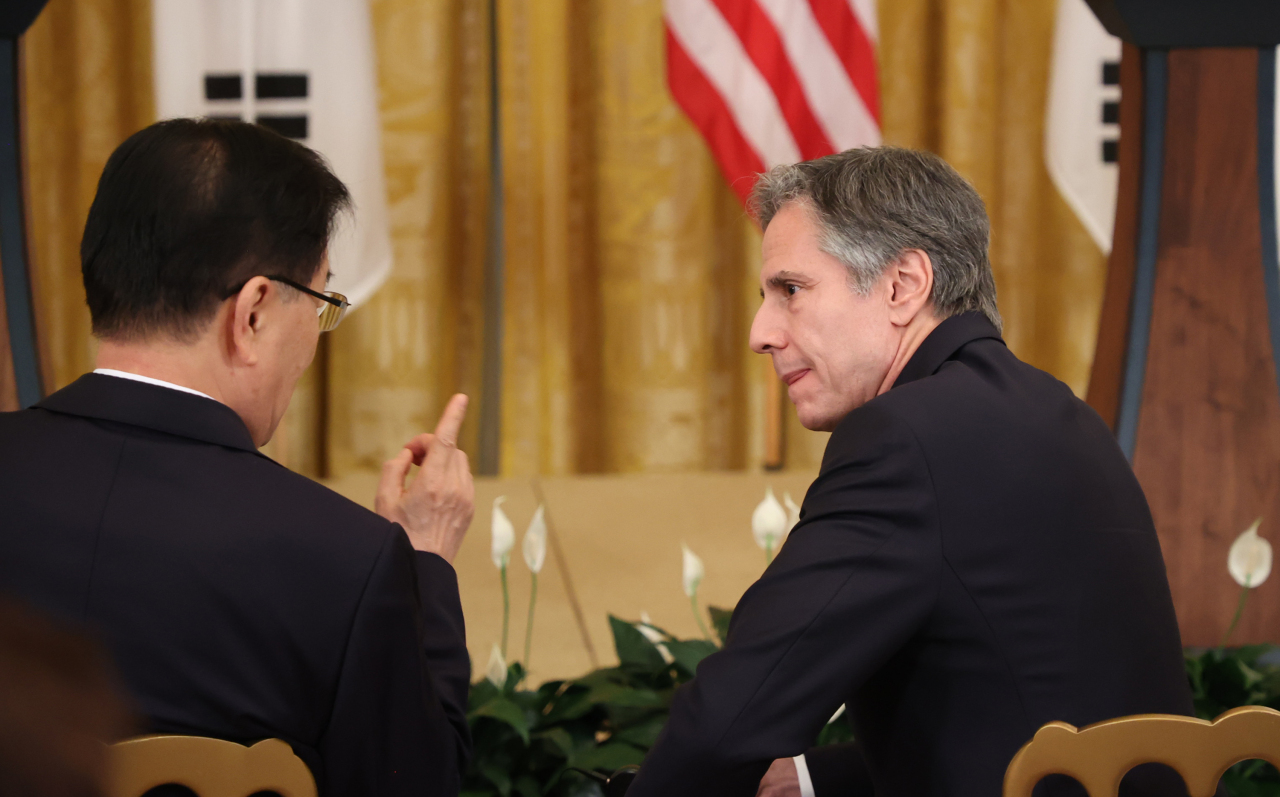 US Secretary of State Antony Blinken (right) and South Korean Foreign Minister Chung Eui-yong talks during a joint press conference of the two countries' leaders at the White House in Washington on Friday. (Yonhap)