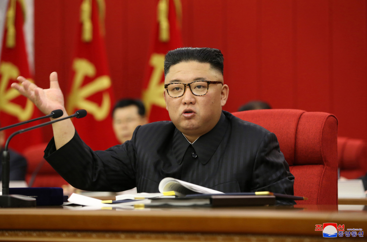 North Korean leader Kim Jong-un speaks at a plenary meeting of the ruling Workers' Party, in this photo disclosed by the Korea Central News Agency on Wednesday. (KCNA-Yonhap)