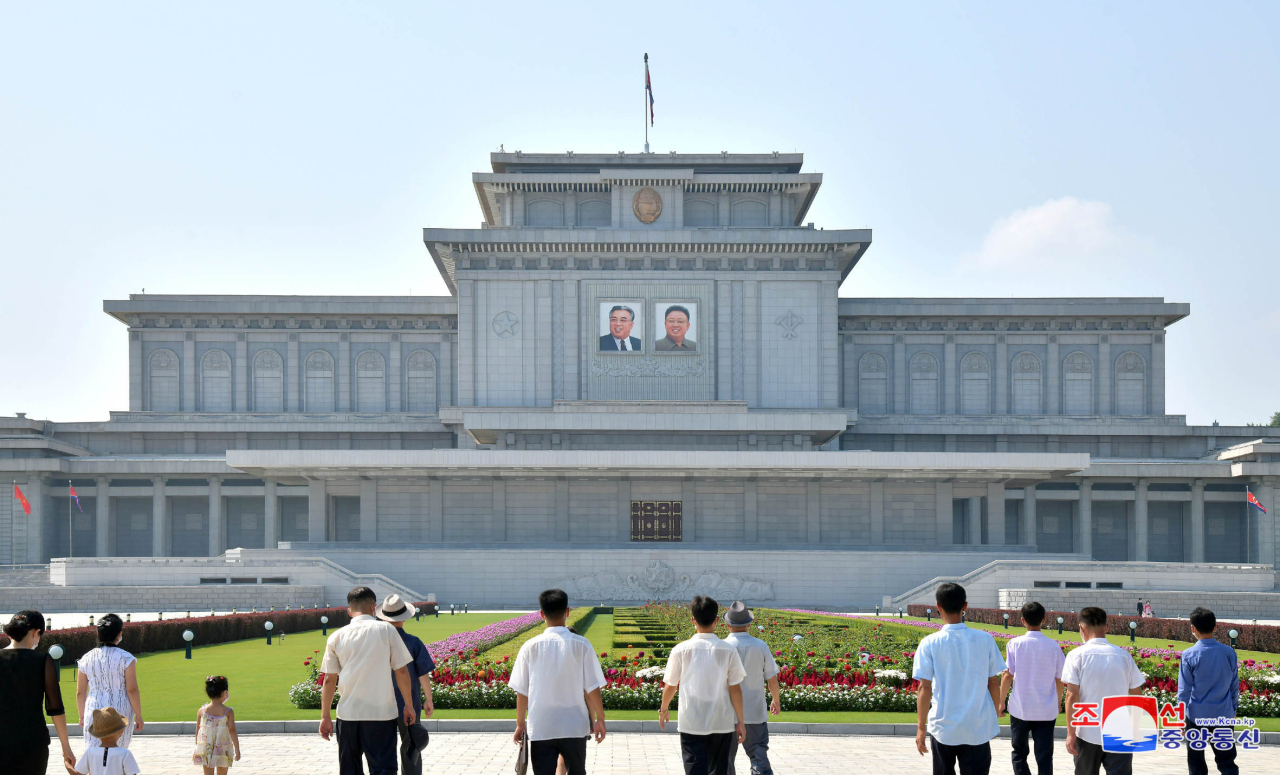 North Korean people celebrate the 68th anniversary of the armistice of the 1950-53 Korean War in Pyongyang on Thursday. (KCNA-Yonhap)