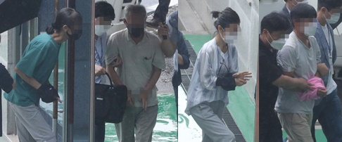북한 지령을 받아 미국산 스텔스 전투기 도입 반대 활동을 했다는 의혹을 받는 충북 청주 지역 활동가 4명이 2일 구속 전 피의자 심문(영장실질심사)을 위해 청주지법 법정에 출석하고 있다. [연합]
