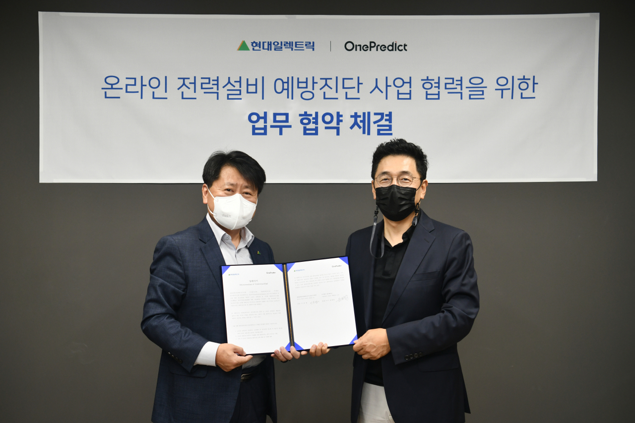 현대일렉트릭이 AI 예지보전 솔루션 개발 기업인 원프레딕트와 '온라인 전력설비 예방진단 솔루션 개발 업무협약(MOU)'을 체결했다. 현대일렉트릭 이준엽 CTO(왼쪽)과 원프레딕트 윤병동 대표이사 [현대중공업 제공]