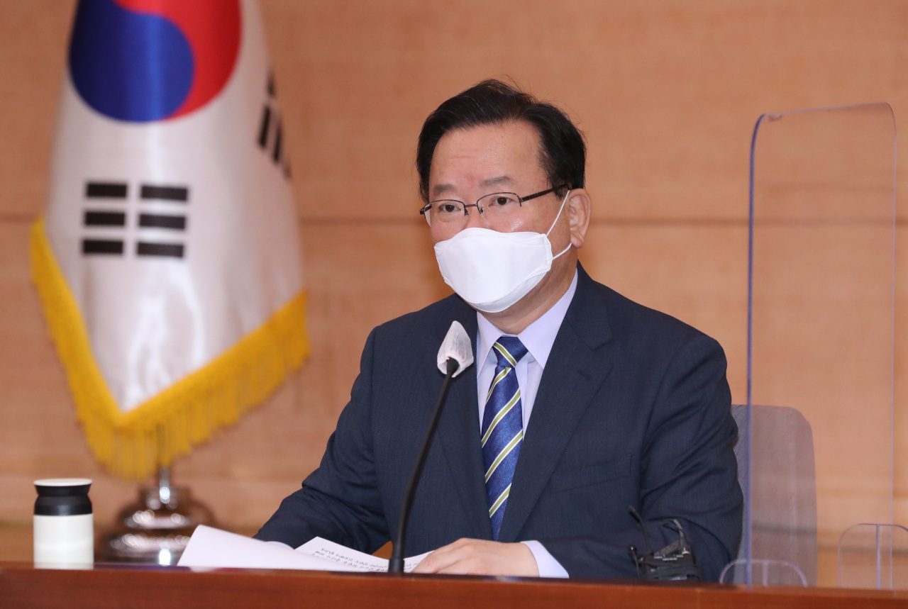 Prime Minister Kim Boo-kyum speaks Wednesday during the first meeting of the government-civilian committee launched to set up guidelines and hold discussions before beginning the normalization process in November. (Yonhap)