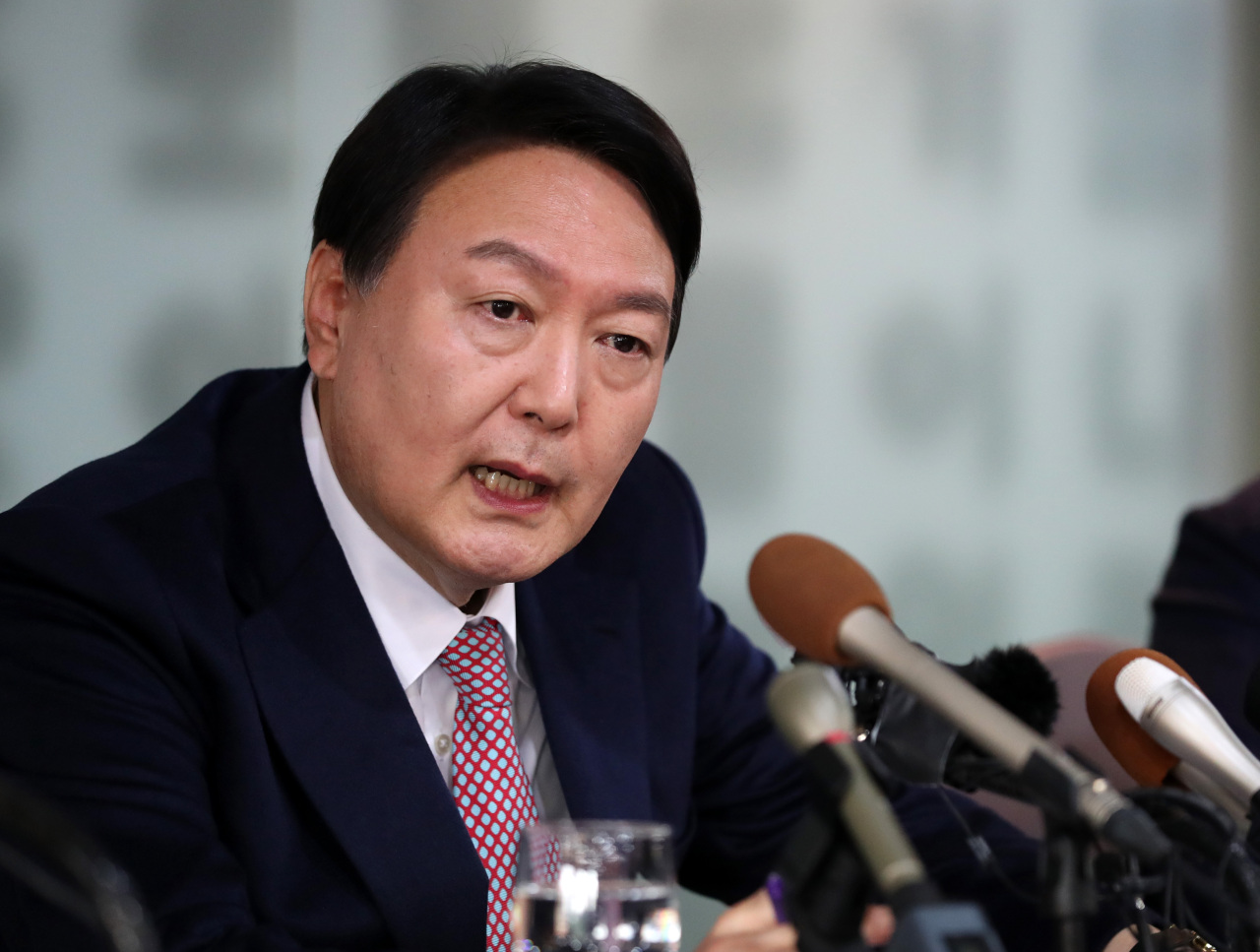 Former Prosecutor Yoon Seok-youl, presidential nominee for the main opposition People Power Party, speaks Friday during a press conference held in Jun-gu, central Seoul. (Joint Press Corps)