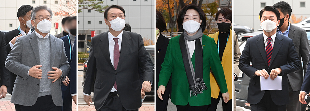 더불어민주당 이재명(왼쪽부터), 국민의힘 윤석열, 정의당 심상정, 국민의당 안철수 대선 후보가 18일 오전 SBS D 포럼 '5천만의 소리, 지휘자를 찾습니다'에 참석하기 위해 서울 마포구 SBS 프리즘타워로 들어가고 있다. 연합뉴스