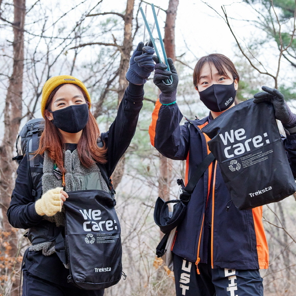 트렉스타 ‘We Care’ 친환경 클린 캠페인에 참여한 참가자 모습. [트렉스타 제공]