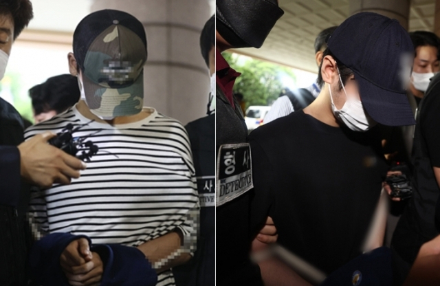 마포구의 한 오피스텔에서 고등학교 동창을 감금해 살인한 혐의를 받는 김모 씨와 안모 씨가 지난 6월 서울 마포구 서울서부지법에서 열린 구속 전 피의자 심문(영장실질심사)에 출석하고 있다. [헤럴드경제DB]