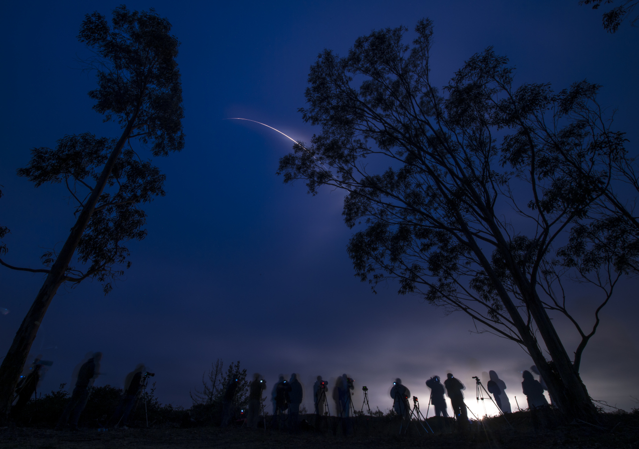 A United Launch Alliance Delta II rocket with the Soil Moisture Active Passive (SMAP) observatory onboard is seen in this long exposure photograph as it launches from Space Launch Complex 2. (NASA/Bill Ingalls)