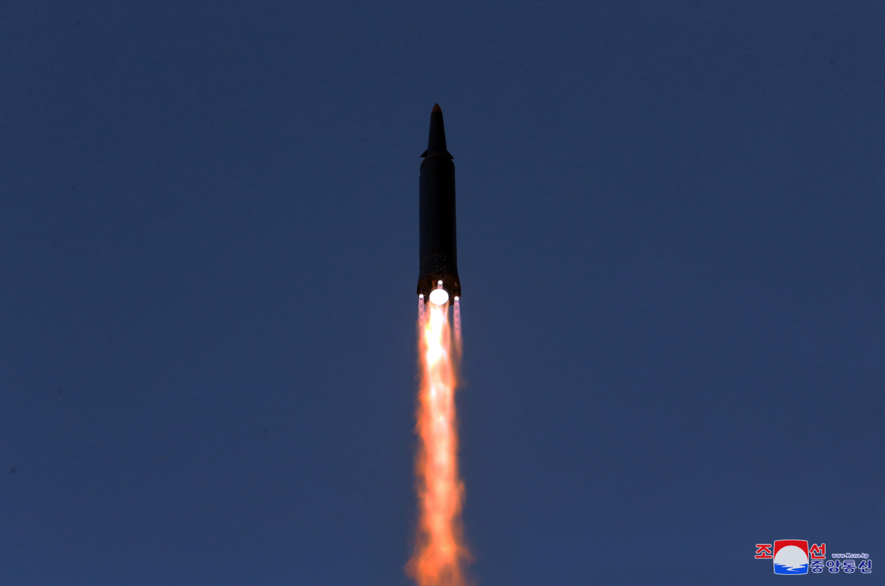 This photo, released by North Korea's official Korean Central News Agency on Wednesday, shows what the North claims to be a new hypersonic missile being launched the previous day. (KCNA-Yonhap)