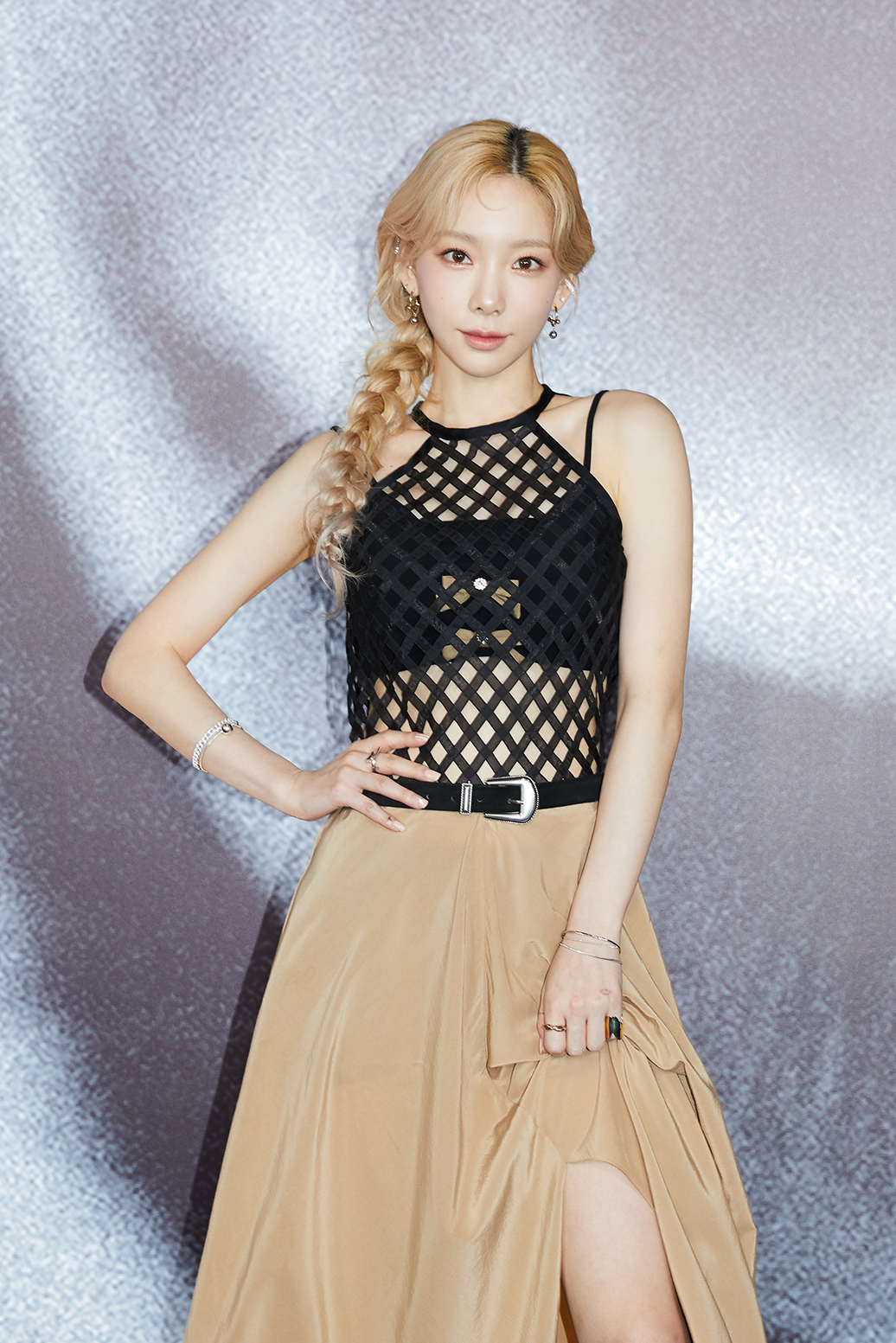 Taeyeon poses for picture during her third LP "INVU" media showcase event on Feb. 14. (S.M. Entertainment)