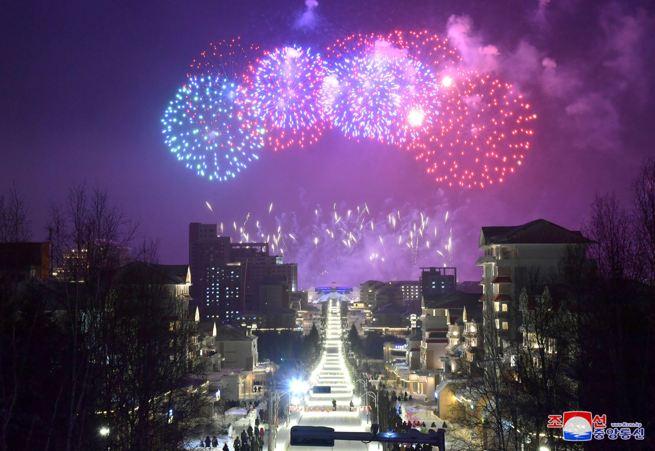 Fireworks are set off in Samjiyon, Ryanggang Province, on Tuesday, to mark the 80th birth anniversary of late North Korean leader Kim Jong-il, in this photo released by the North's official Korean Central News Agency. The anniversary falls on Wednesday. (KCNA)