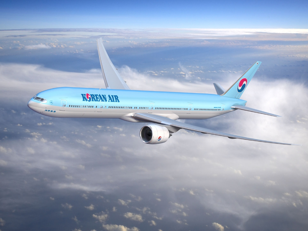 This file photo shows Korean Air's B777-300ER passenger jet flying in the air. (Korean Air)