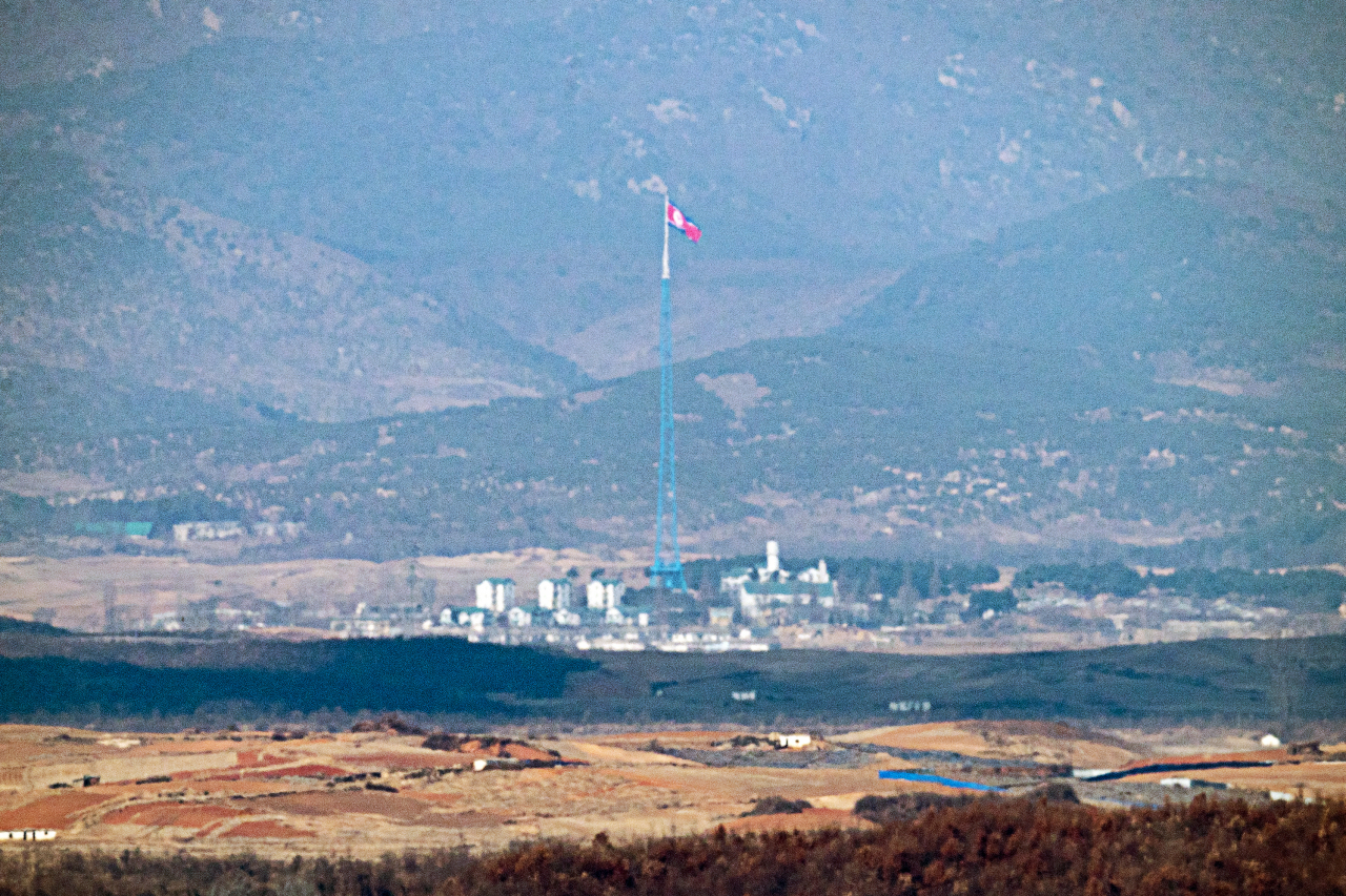 Last Tuesday, file photo shows a North Korean flag in the North Korean village inside the Demilitarized Zone. (Yonhap)