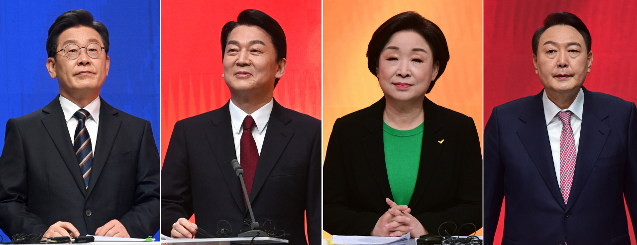 21일 오후 서울 마포구 MBC 미디어센터 공개홀에서 열린 중앙선거방송토론위원회 주관 제20대 대통령선거 후보 초청 1차 토론회에 앞서 대선 후보들이 토론 준비를 하고 있다. 왼쪽부터 더불어민주당 이재명 대선후보, 국민의당 안철수 대선후보, 정의당 심상정 대선후보, 국민의힘 윤석열 대선후보. [연합]