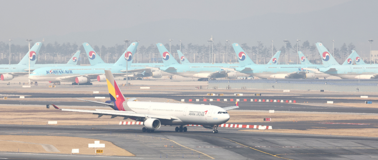 지난 9일 인천국제공항 내 대한항공, 아시아나항공 여객기. [연합]