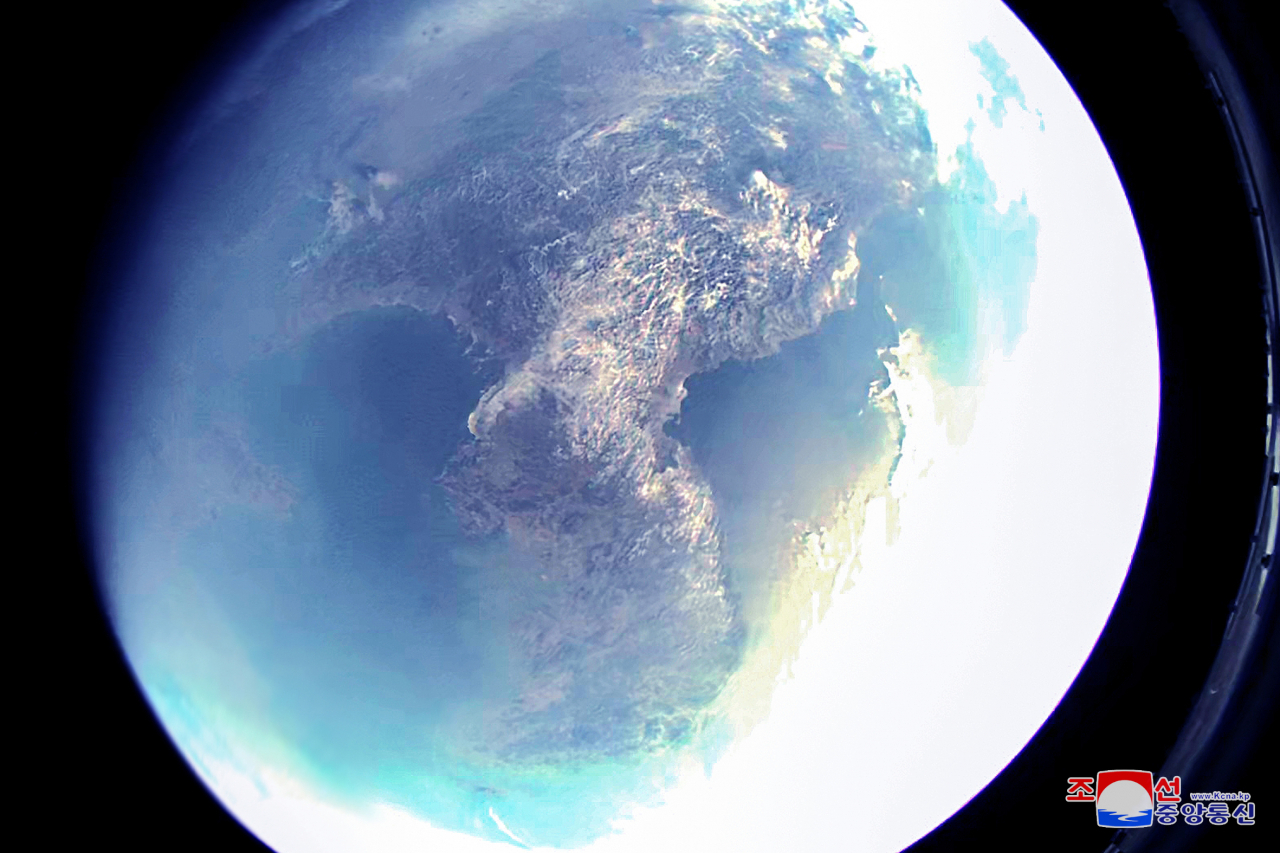 This photo, released by North Korea's Korean Central News Agency on Monday, shows an image of the Earth taken by a camera during the country's test for the development of a "reconnaissance satellite" the previous day. (KNCA-Yonhap)