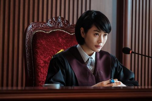 This image provided by Netflix shows a scene from "Juvenile Justice." (Netflix)