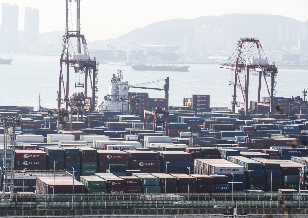 This file photo, taken Feb. 11, 2022, shows stacks of containers at a port in South Korea's southeastern city of Busan. (Yonhap)