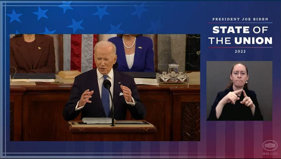 US President Joe Biden (L) is seen delivering a State of the Union address at US Capitol in Washington on Tuesday, in this image captured from the website of the White House. (Website of the White House)