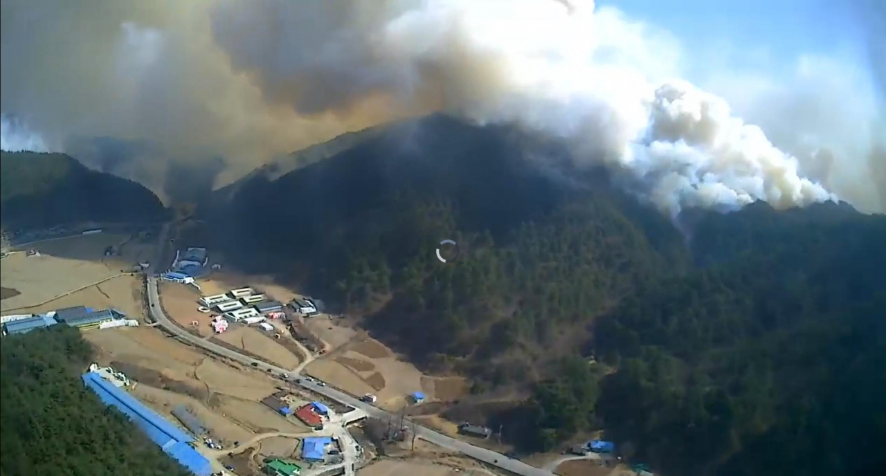 This photo, provided by the Korea Forest Service, shows a wildfire that broke out in the eastern coastal county of Uljin on Friday. (Yonhap)