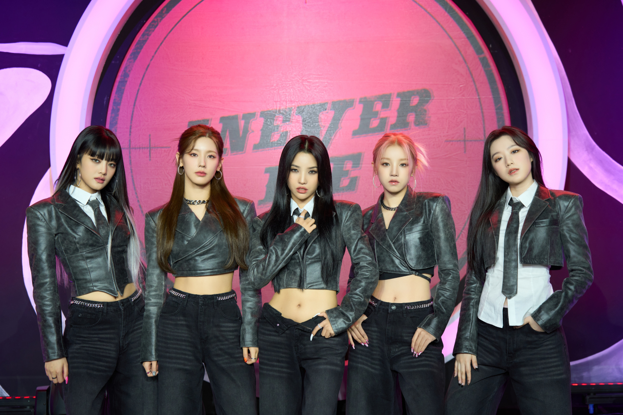 (G)I-dle poses for pictures during the “I Never Die” media showcase in Seoul on Monday. (Cube Entertainment)
