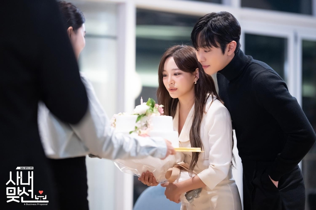 This image provided by SBS shows a scene from "Business Proposal." (SBS)