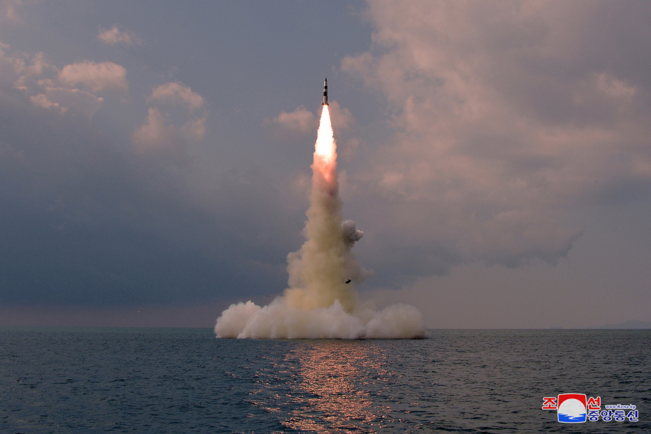 In this photo released Oct. 20, 2021 by North Korea's official Korean Central News Agency, a new type of a submarine-launched ballistic missile (SLBM) is test-fired from waters the previous day. The South Korean military said on Oct. 19 that North Korea fired what appears to be an SLBM toward the East Sea from waters east of Sinpo, a city on the North's east coast. (KCNA)