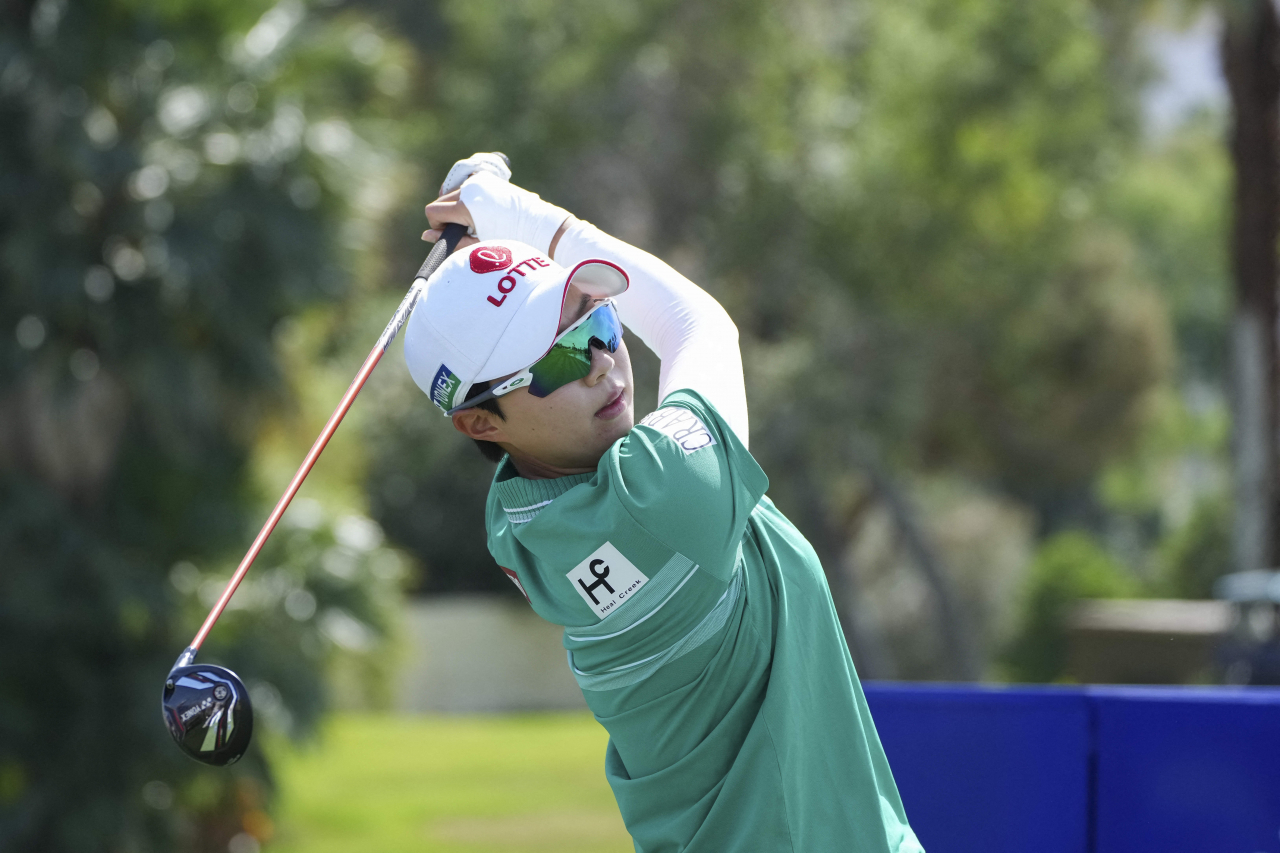 In this Associated Press photo, Kim Hyo-joo of South Korea tees off on the fourth hole during the third round of the Chevron Championship at the Dinah Shore Tournament Course of Mission Hills Country Club in Rancho Mirage, California, on Saturday. (AP)