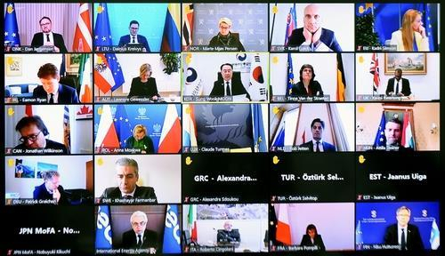 This photo, provided by South Korea's industry ministry on March 2, 2022, shows the ministerial-level Extraordinary Governing Board meeting of the International Energy Agency (IEA), which was attended by 31 nations the previous day. During the meeting, the countries agreed to release 60 million barrels of oil from their emergency reserves amid the Ukraine crisis. (South Korea's industry ministry)