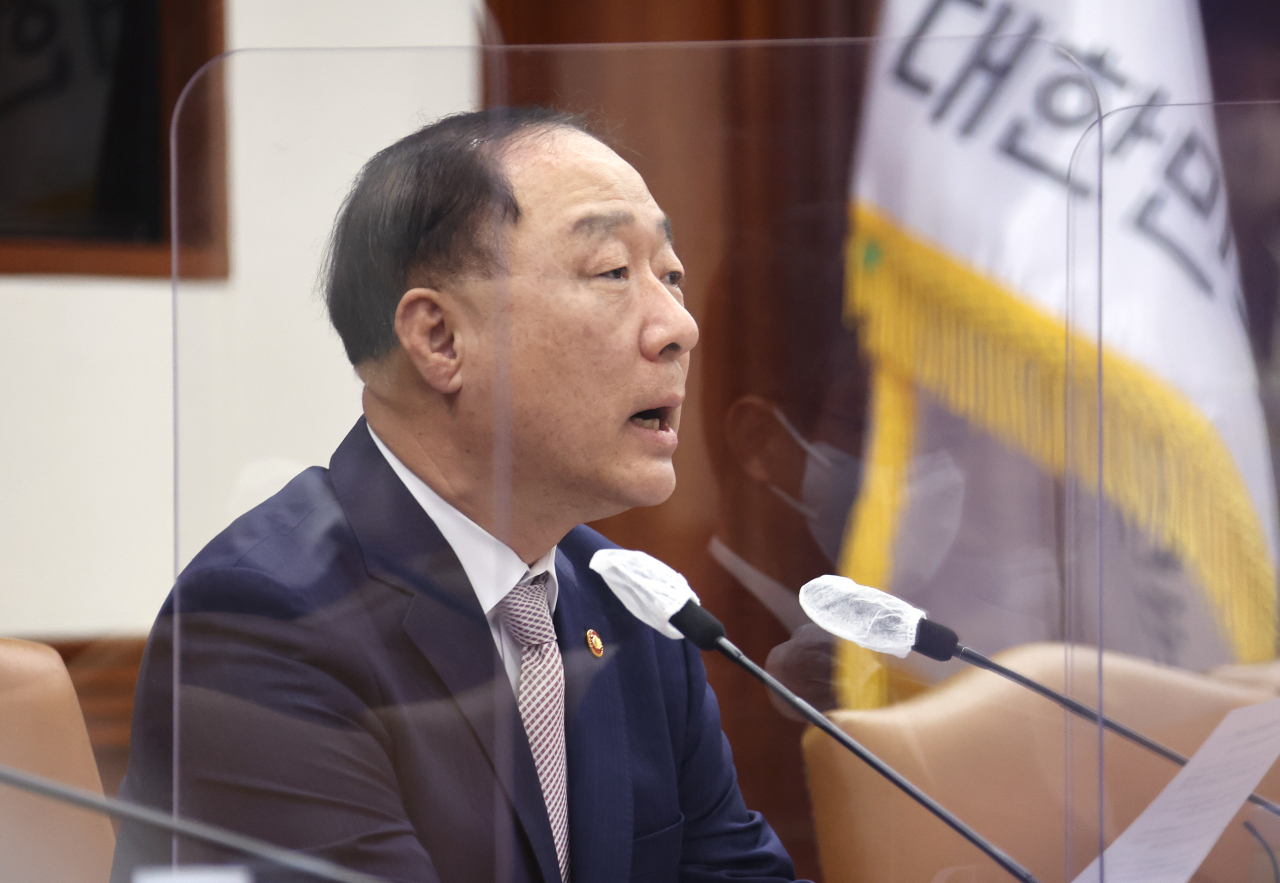 Finance Minister Hong Nam-ki presides over a meeting on economic security and strategy at the government complex building in Seoul on Friday. (Yonhap)
