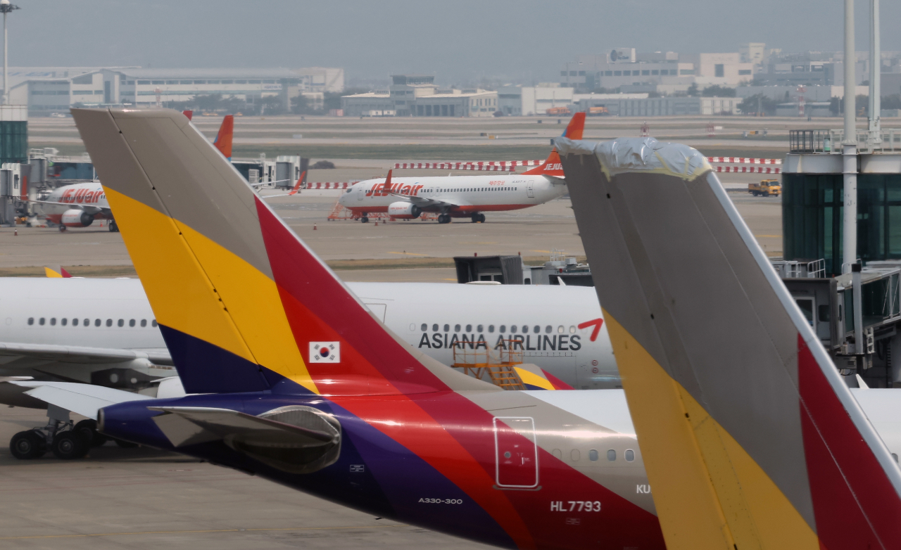 인천국제공항 제1여객터미널의 항공기들. [연합]