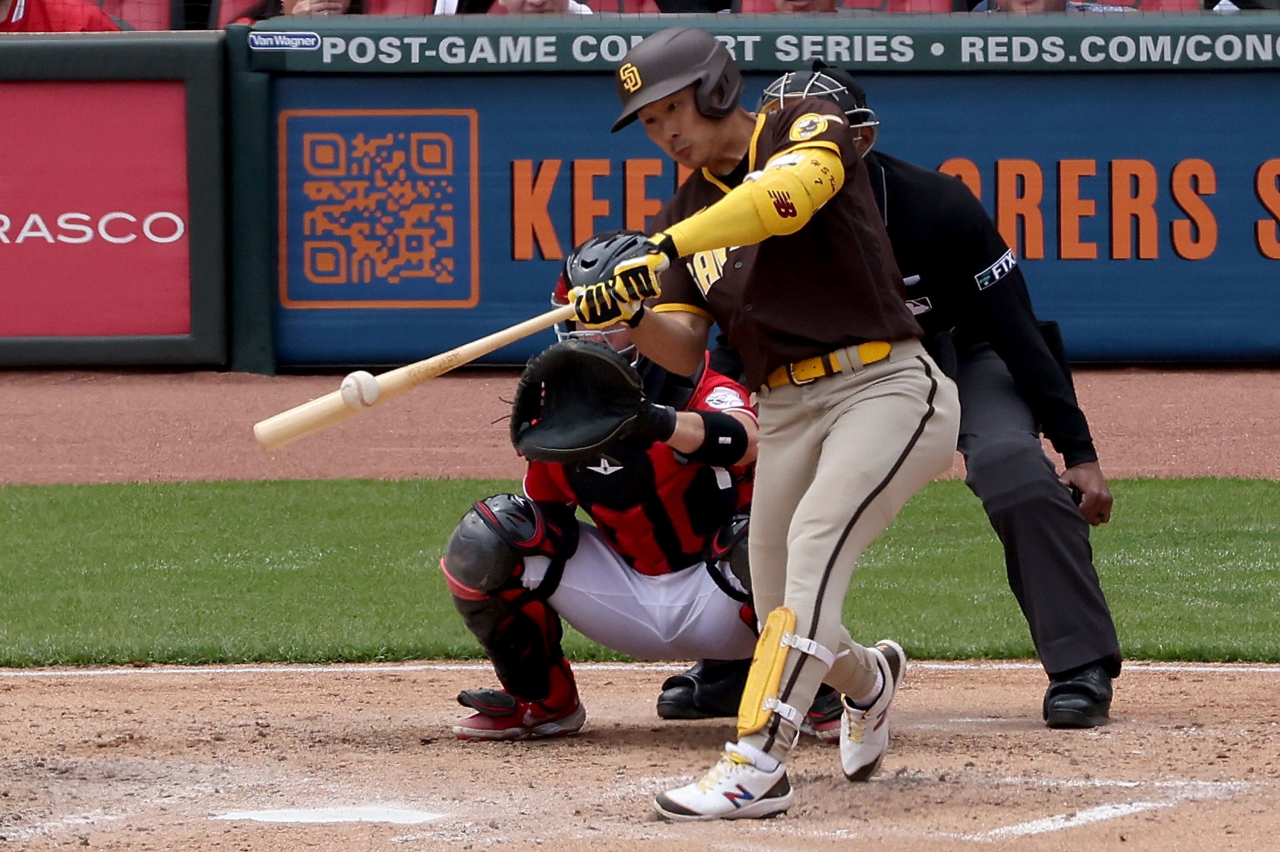 In this Getty Images photo, Kim Ha-seong of the San Diego Padres hits a double against the Cincinnati Reds during the top of the sixth inning of a Major League Baseball regular season game at Great American Ball Park in Cincinnati last Thursday. (Getty Images)
