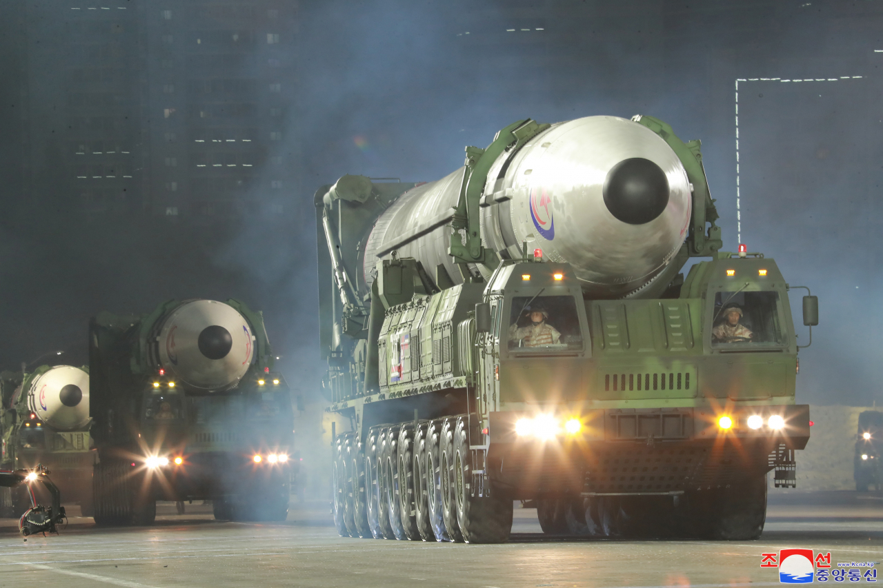 A new Hwasong-17 missile is displayed during a military parade at Kim Il-sung Square in Pyongyang last Monday, as North Korea marked the 90th anniversary of the founding of its army with North Korean leader Kim Jong-un in attendance, in this photo released the next day by the North's official Korean Central News Agency. (KCNA)