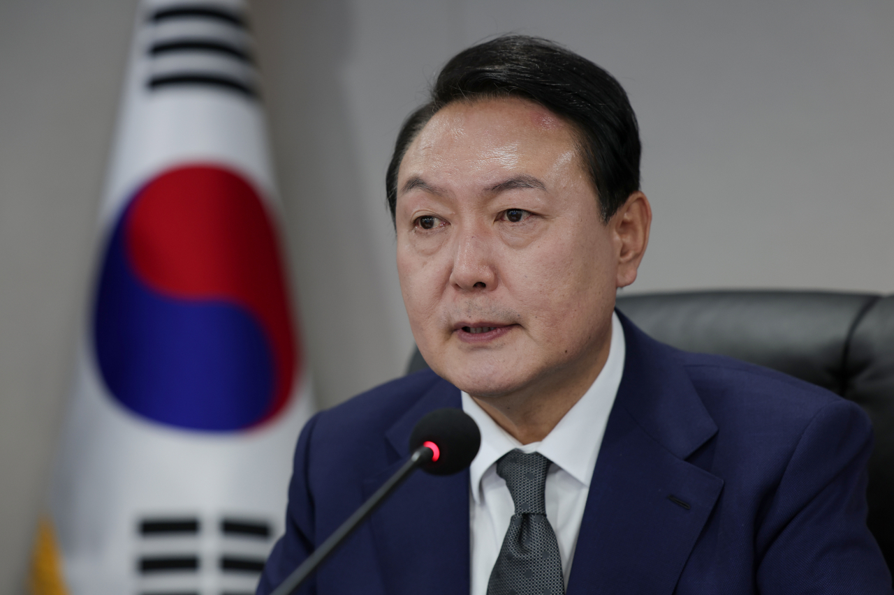 President Yoon Suk-yeol receives a briefing from the military in the underground bunker of the new presidential office in Yongsan, Seoul, on Tuesday, in this photo provided by his office. (Yoon's presidential office)