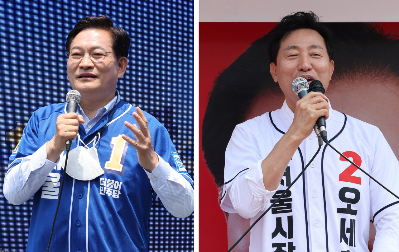 더불어민주당 송영길 서울시장 후보(왼쪽)와 국민의힘 오세훈 서울시장 후보가 21일 서울 시내에서 유세하고 있다. [연합]