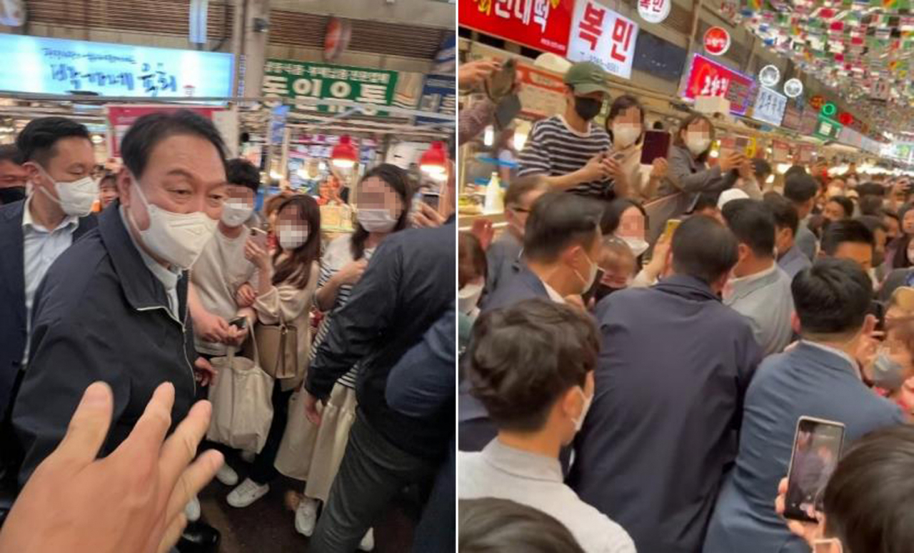 윤석열 대통령이 취임 후 첫 주말인 지난달 14일 서울 종로구 광장시장을 방문했다. 대통령실은 이날 윤 대통령이 부인 김건희 여사와 함께 광장시장을 찾아 빈대떡과 떡볶이 등을 포장 구매했다고 밝혔다. [연합]