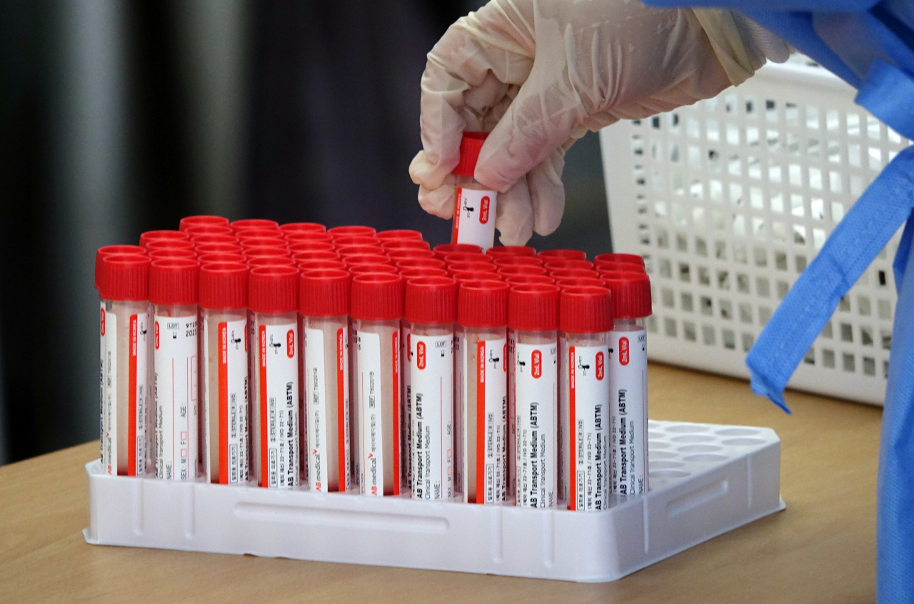 This photo, taken on Tuesday, shows a batch of COVID-19 test kits. (Yonhap)