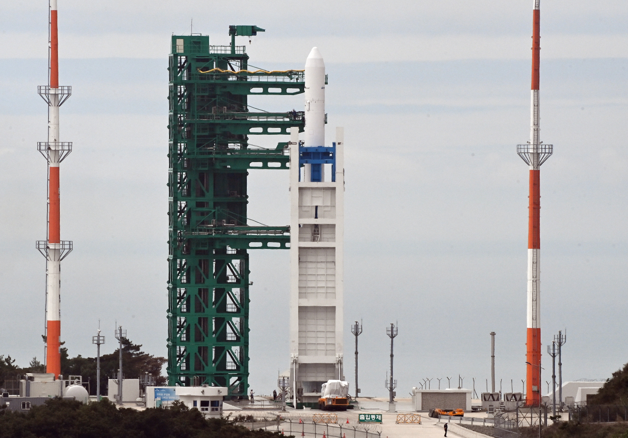 South Korea's homegrown space rocket Nuri is erected at the launch pad at Naro Space Center in Goheung, some 470 kilometers south of Seoul, on Monday, a day before its scheduled launch. (Yonhap)