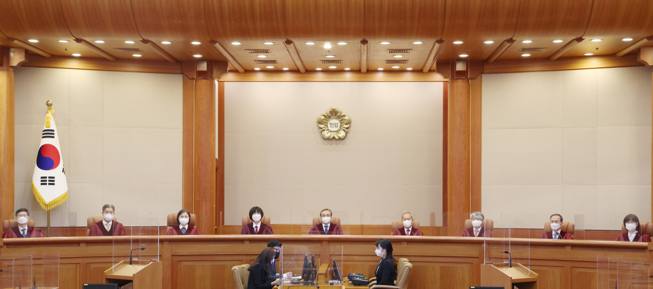 유남석 헌법재판소장을 비롯한 재판관들이 지난 7월 21일 오후 서울 종로구 헌법재판소에서 열린 선고를 앞두고 자리에 앉아 있다. [연합]