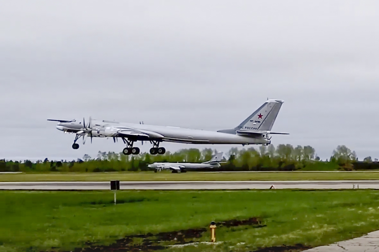 In this photo released by Russian Defense Ministry Press Service on May 24, 2022, a Tu-95 strategic bomber of the Russian air force takes off on a mission at an undisclosed location. South Korea said Tuesday, Aug. 23, 2022, that Russian warplanes entered its air buffer zone unannounced, and that it responded with unspecified "tactical action," a term that usually refers to the scrambling of fighter jets to chase away unauthorized foreign aircraft. (Russian Defense Ministry Press Service via AP, File)