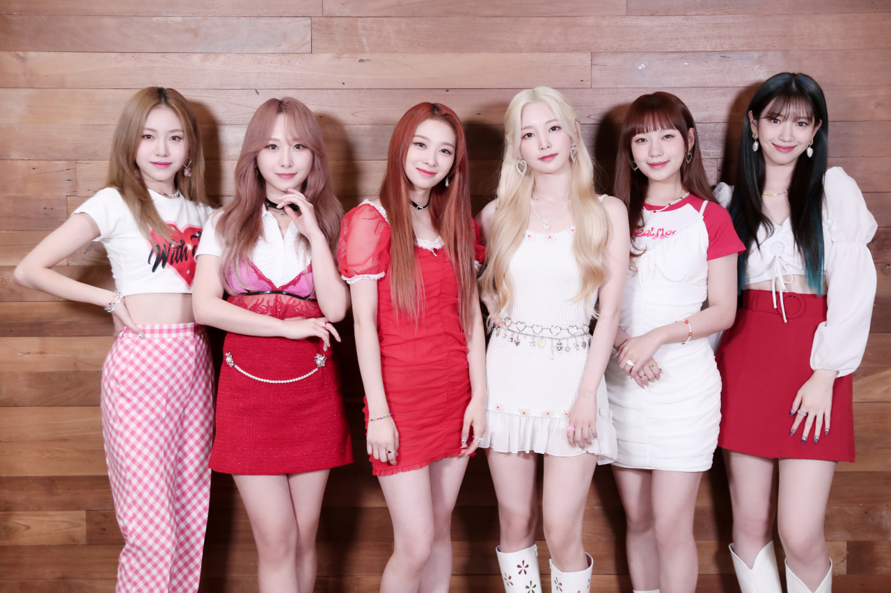 Rocket Punch poses for pictures during a press conference for “Flash,” in Seoul on Monday. (Woolim Entertainment)